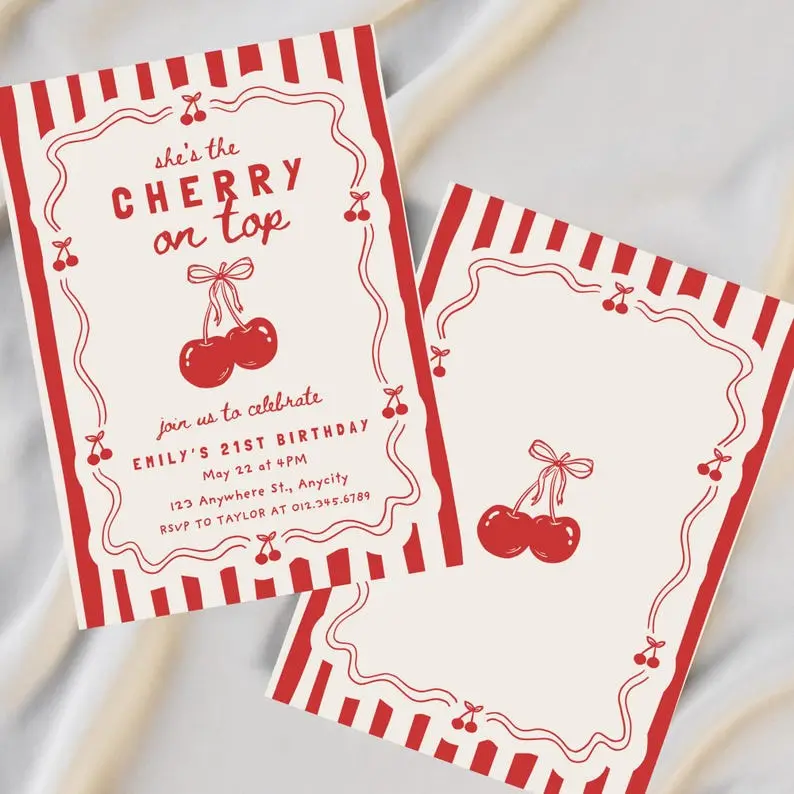 She's the Cherry On Top birthday invitation in red on cream, with a pair of hand-drawn cherries tied with a bow inside a wavy frame and red striped edges