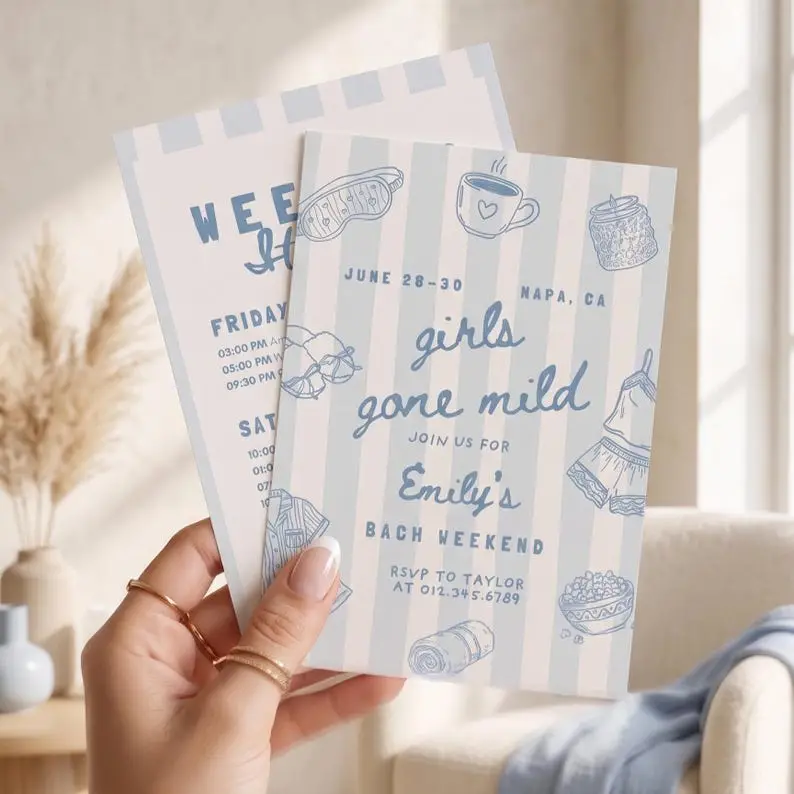 Girls Gone Mild bachelorette invitation on a pale blue and cream striped card, with hand-drawn sleep mask, heart mug, candle, cami and shorts, rolled towel and popcorn bowl, shown with a matching itinerary card
